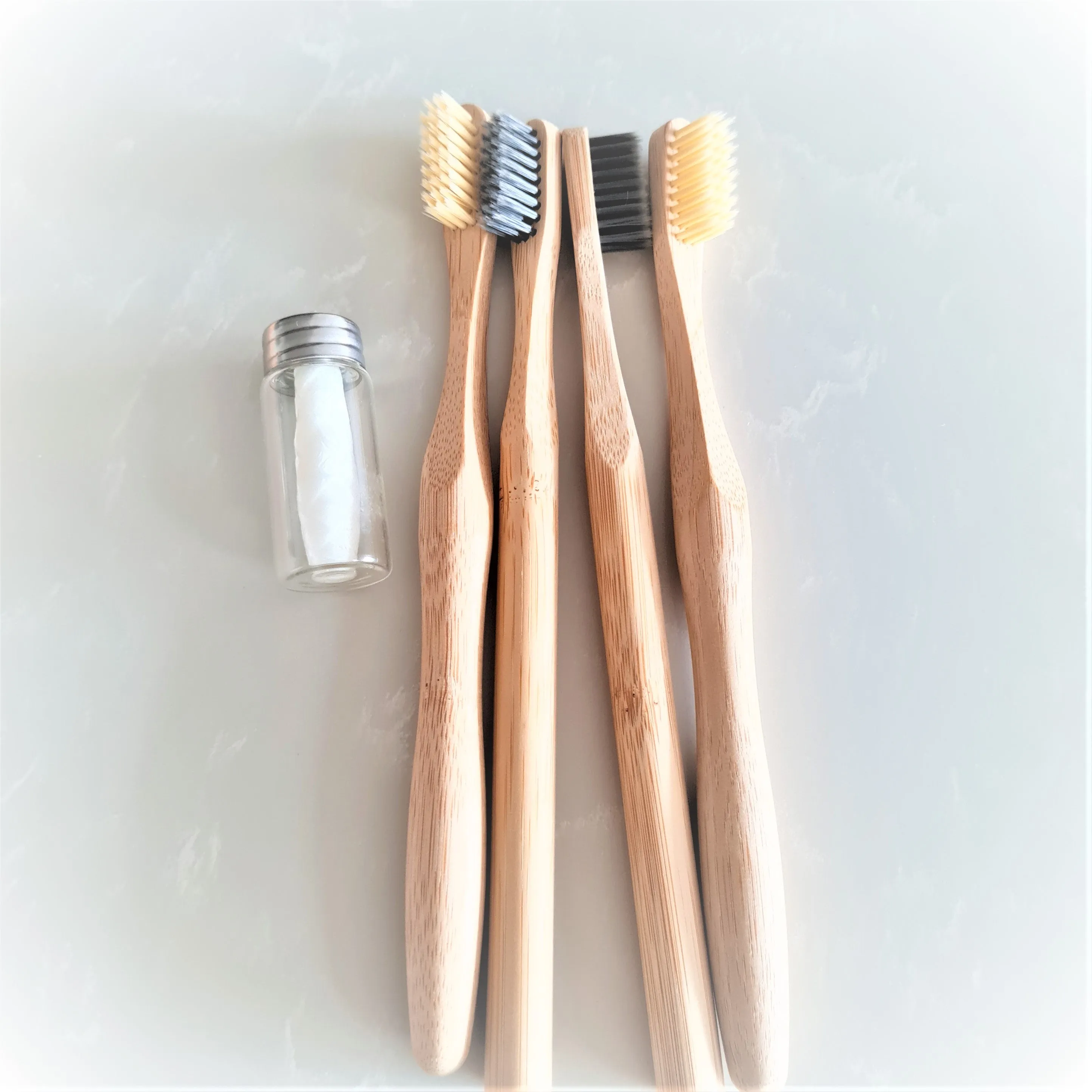 4 Pack Bamboo Toothbrush and Biodegradable  Floss set