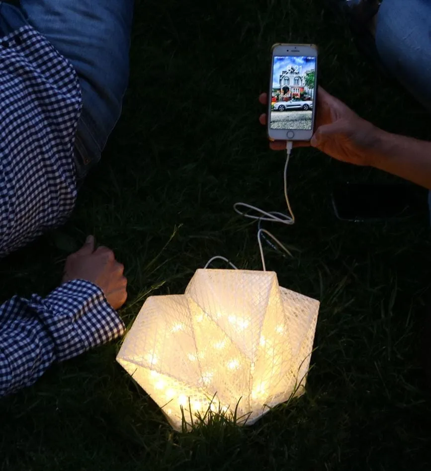 Solar-Powered Light   Power Bank: Solar QWNN