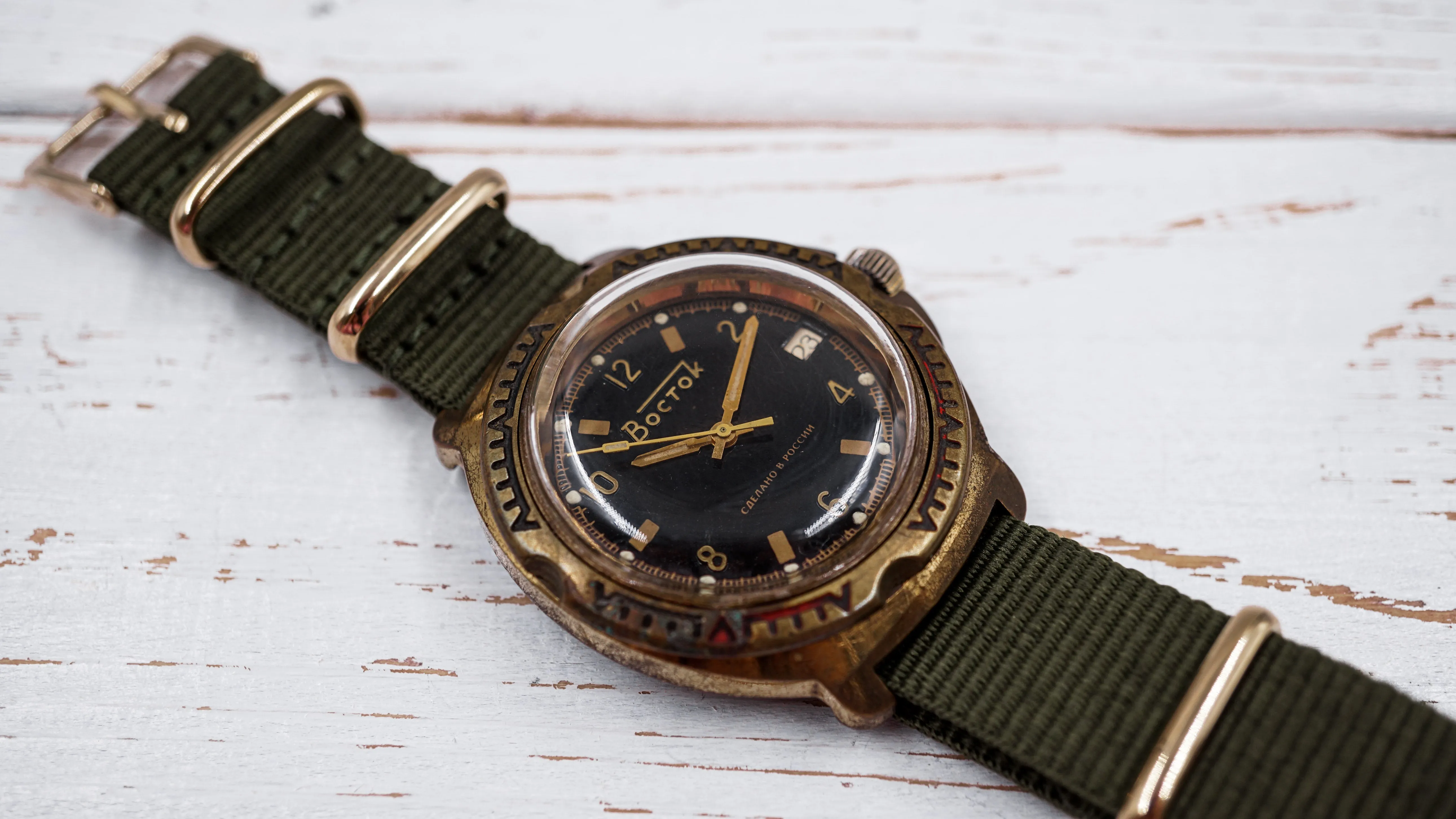 Vintage soviet mechanical men's watch VOSTOK, black dial, brass case