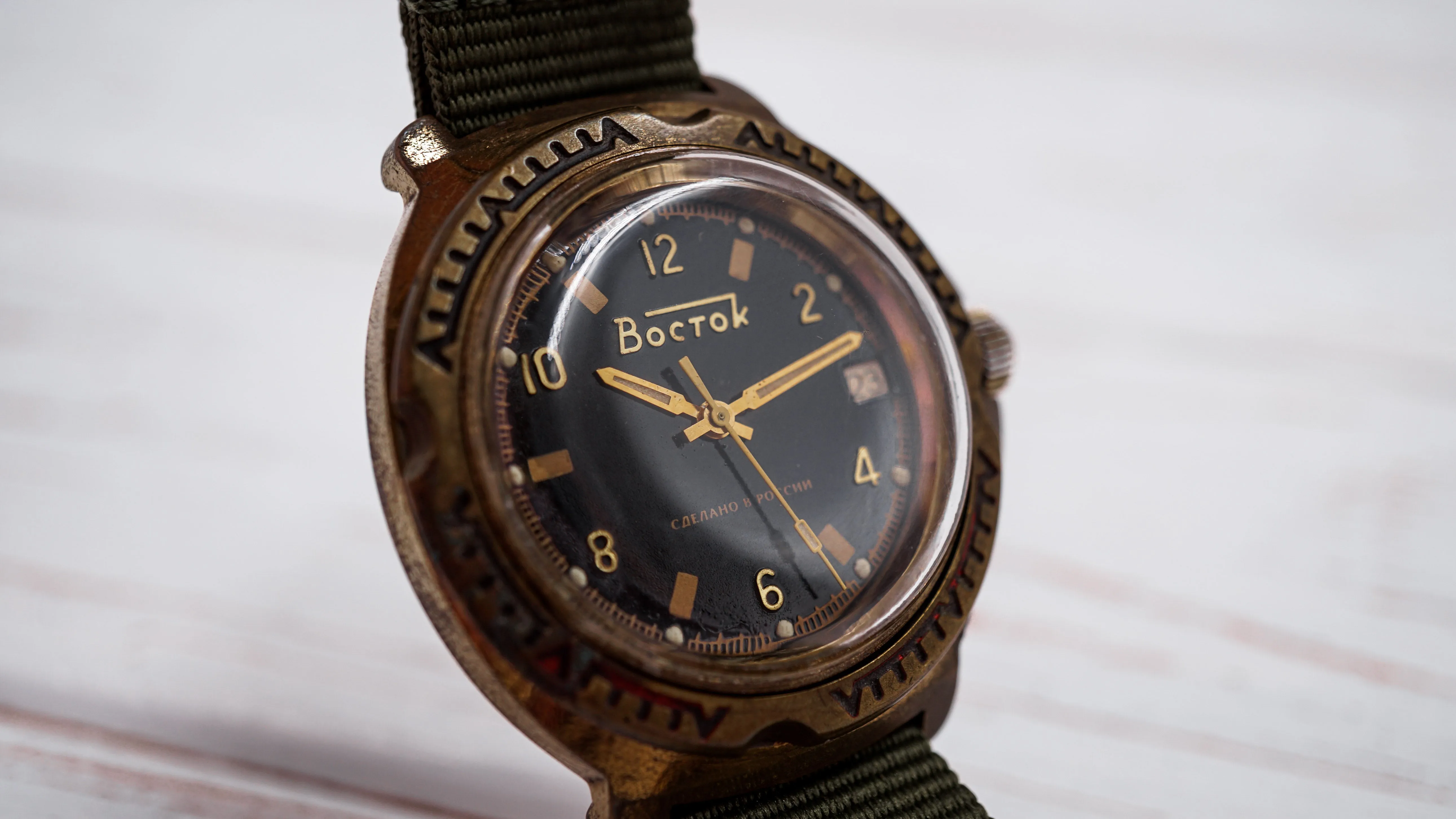 Vintage soviet mechanical men's watch VOSTOK, black dial, brass case