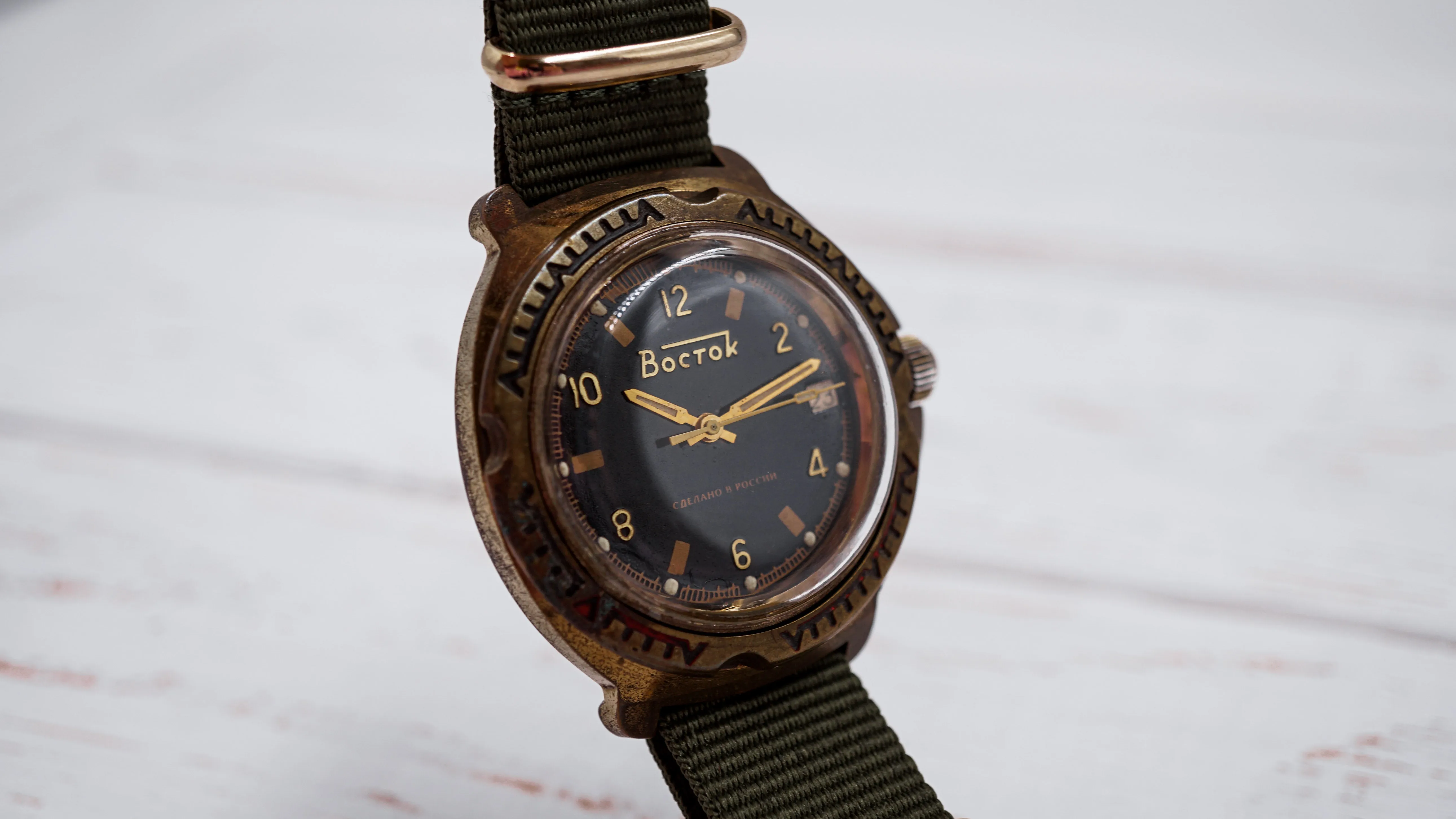 Vintage soviet mechanical men's watch VOSTOK, black dial, brass case