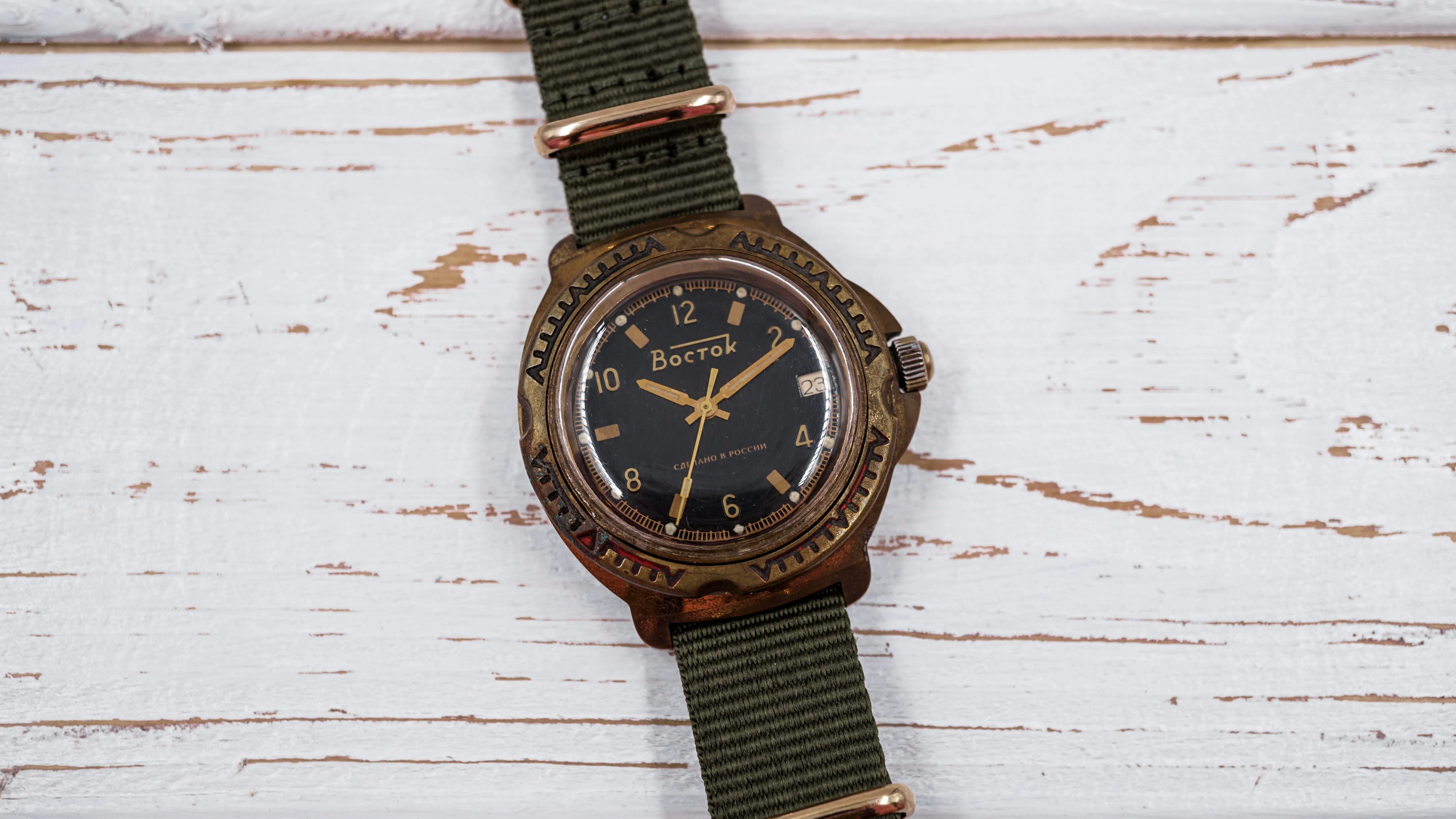 Vintage soviet mechanical men's watch VOSTOK, black dial, brass case