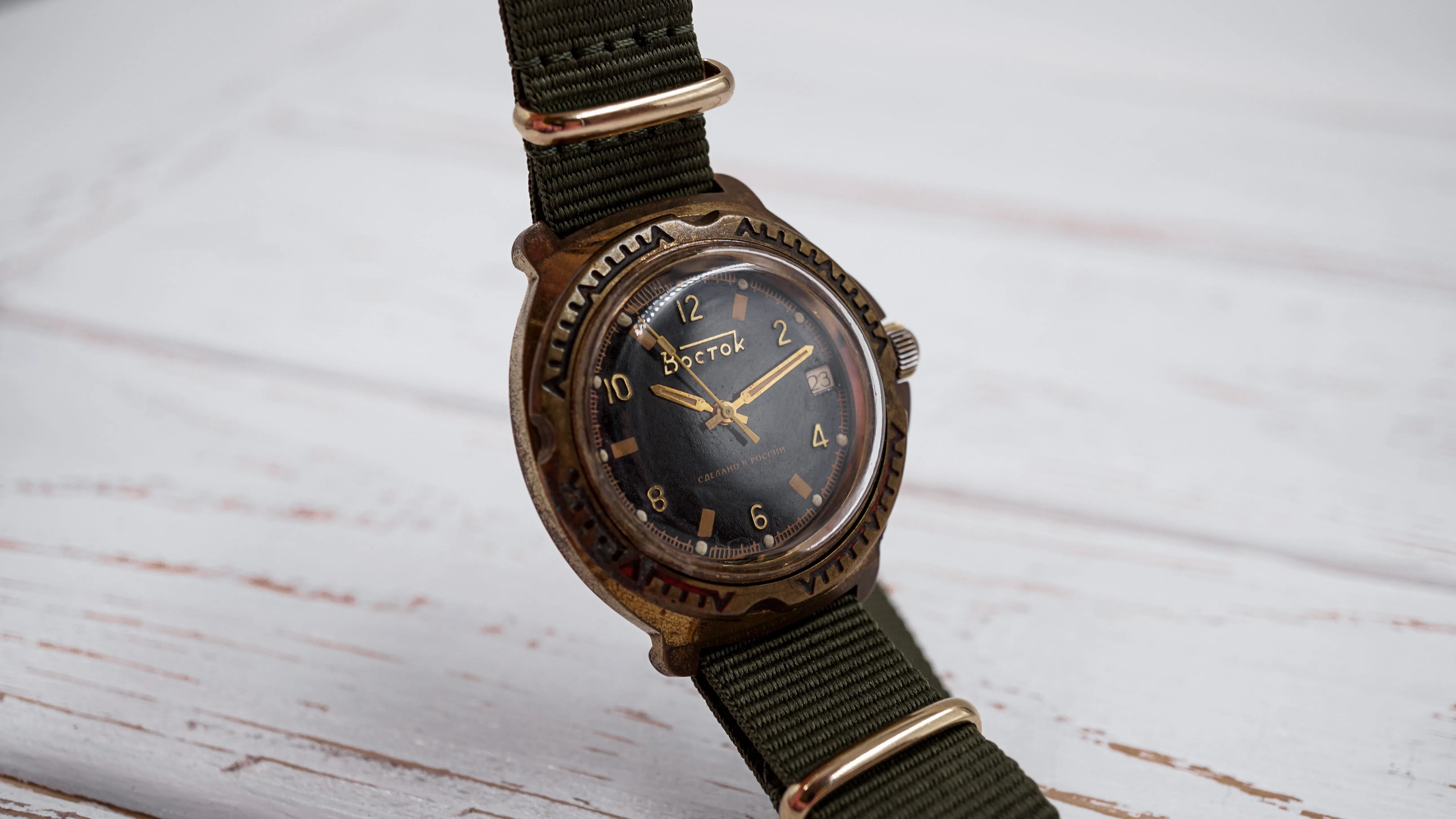 Vintage soviet mechanical men's watch VOSTOK, black dial, brass case