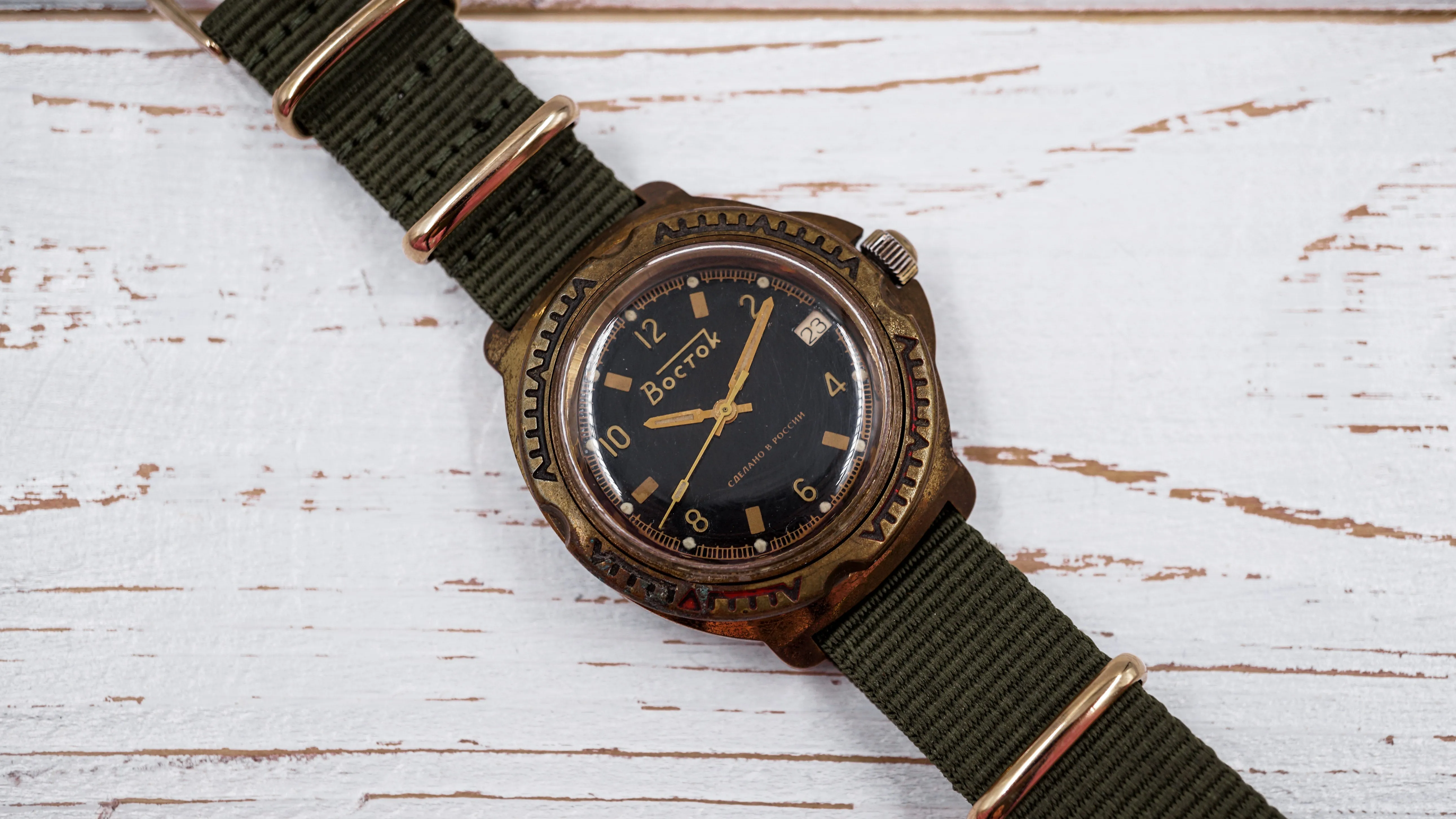 Vintage soviet mechanical men's watch VOSTOK, black dial, brass case